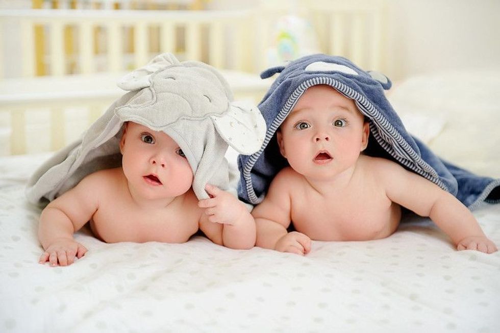 Adorable five months old baby boy twins.