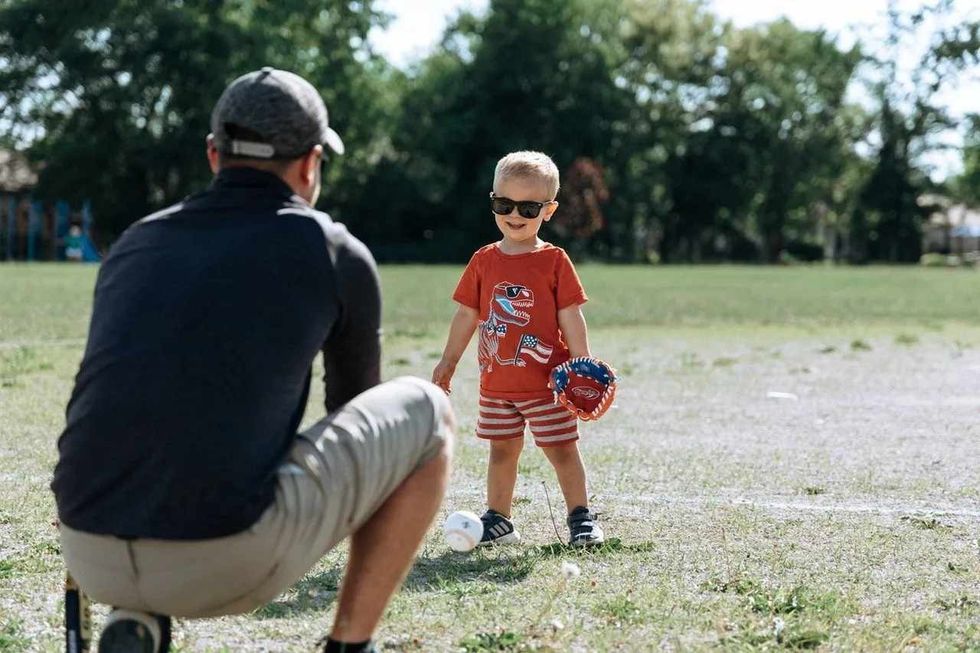 Father and son playing outdoor games