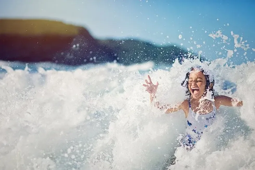 Girl playing in water