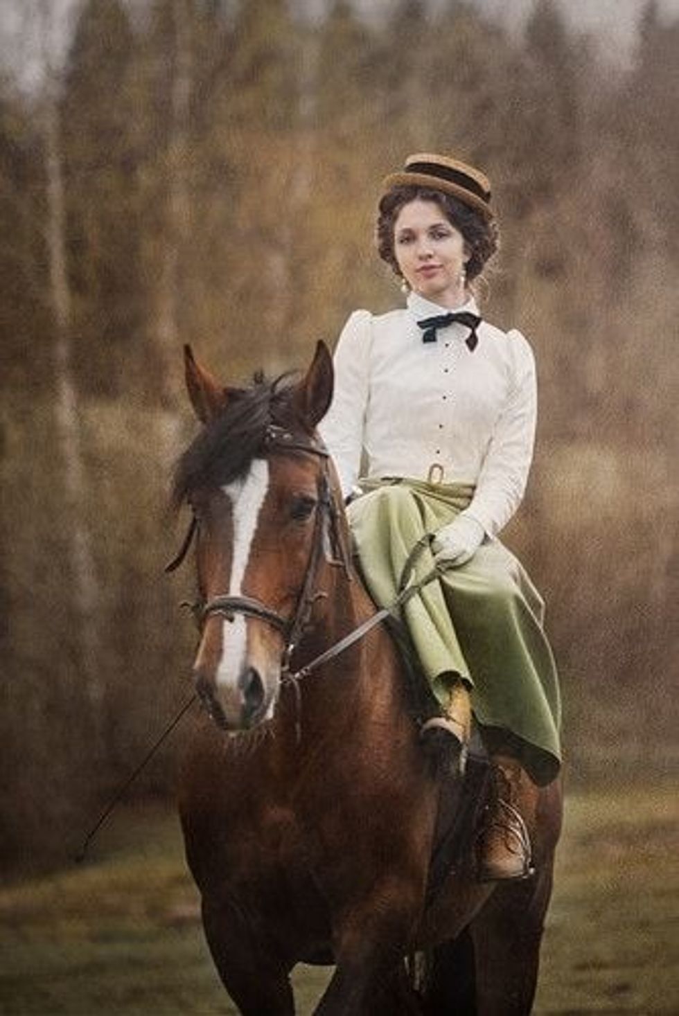 Noblewomen horse riding side saddle.