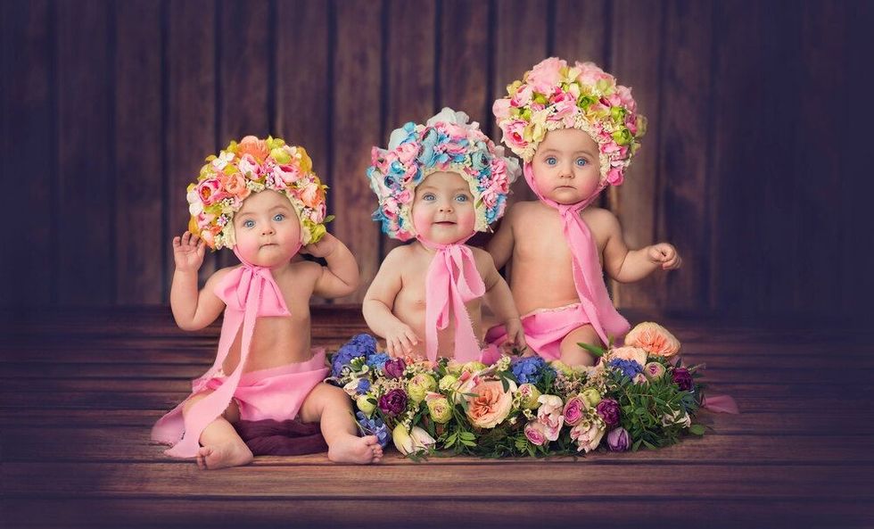 Very cute sisters triplets together.